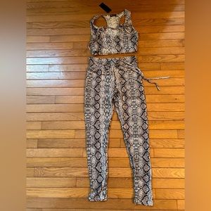 Brand new, 2 piece, crop top and leggings.
